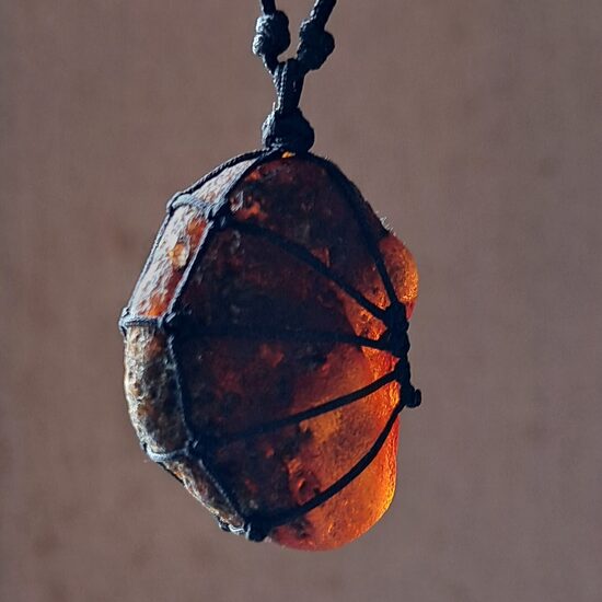 Raw amber amulets, jewellery